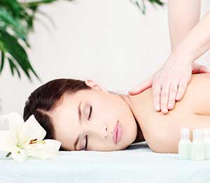 a woman getting a back massage